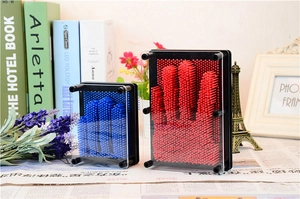 Blue and red 3D pin art clone hand mold toys in different sizes with black frame