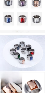 Macro detail of rectangular gemstones set in brushed titanium steel minimalist rings