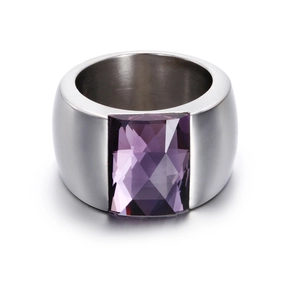 Macro detail of silver titanium steel ring featuring a large rectangular purple gemstone