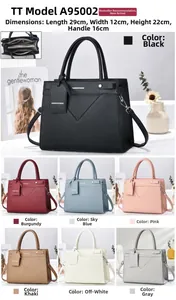 Detail view of large leather tote bag with multi-compartment interior and color options