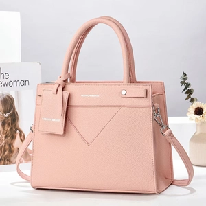 Pink lychee grain leather crossbody handbag with dual handles and detachable shoulder strap