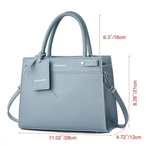 Detailed dimensions of blue crossbody bag with top handle and pebble leather texture