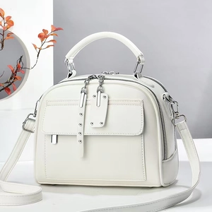 Chic beige large capacity crossbody bag with pebble grain leather and silver hardware