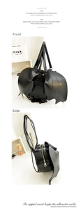 Front- und Seitenansicht eines Gothic-Fledermaus-Rucksacks mit Spitze und Gold-Zipper