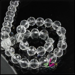 Macro shot of faceted transparent star-shaped glass charms for DIY jewelry making