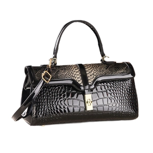 Glossy black embossed leather handbag with gold hardware and top handle for women