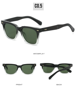 Detail view of square sunglasses with gradient frames, green lenses, and gold rivet accents