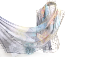 Detail of translucent floral silk scarf with elegant lotus print on a light chiffon fabric