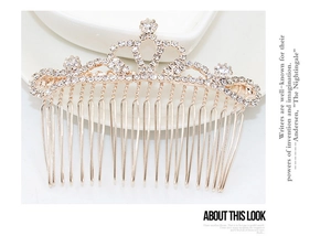 Macro shot of crown shaped hair comb with sparkling rhinestones in gold finish