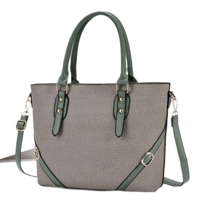 Trapezoid tote bag in grey woven fabric with green leather straps and gold hardware