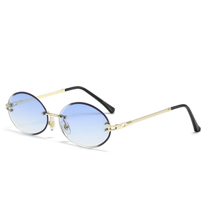 Trendy rimless oval sunglasses with blue gradient lenses and gold metal twisted temples