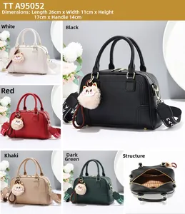 Detailed size guide for versatile pebble leather handbags with wide shoulder straps