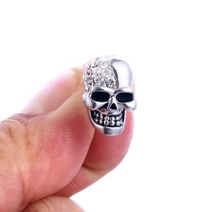 Vintage silver skull stud earrings with sparkling rhinestones for Halloween fashion