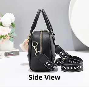 Side view of black lychee leather Boston handbag with woven strap and gold hardware detail
