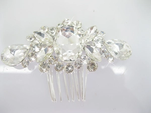 Detail view of silver floral hair comb with sparkling crystals and rhinestones