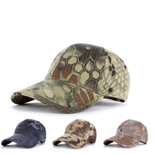 Detail of four tactical camouflage boonie hats in various python patterns for outdoors