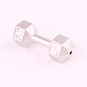 Macro shot of silver zinc alloy dumbbell pendant with Fit Life engraved details