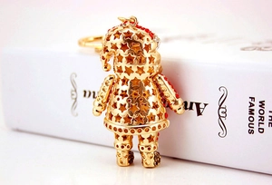 Detail of Santa Claus keychain featuring colorful rhinestones and hollow star patterns