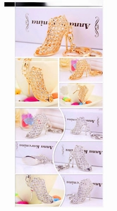 Detail of hollowed-out crystal high heel keychains in gold and silver finishes