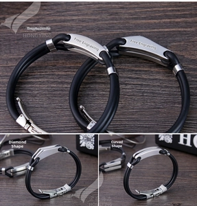 Détails de bracelets en silicone noir avec plaques en acier inoxydable losanges et courbes