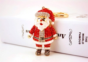 Detailed side view of Santa Claus keychain with red rhinestones and gold alloy hook