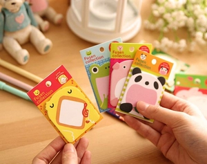 Detailed view of cartoon animal sticky notes featuring chicken, frog, and panda designs