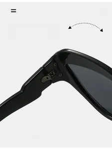 Détail des charnières métalliques durables sur les lunettes de cyclisme œil-de-chat noires
