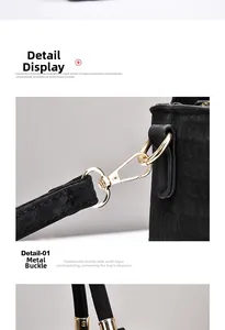 Detail of high-quality gold hardware buckle on a black crocodile pattern handbag