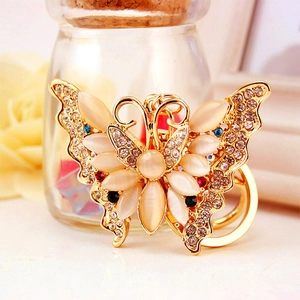 Exquisite gold butterfly keychain with cat eye stones and rhinestones for bags