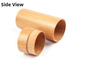 Detail view of a natural cylindrical bamboo eyewear case with smooth wood grain texture