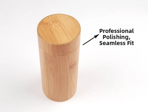Detailed view of cylindrical bamboo case featuring smooth polished texture and seamless lid