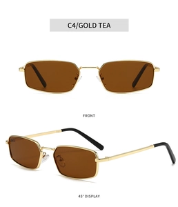 Detail view of gold metal rectangular sunglasses with tea lenses and black temple tips