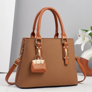 Elegant brown satchel handbag with woven texture and gold hardware for women