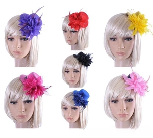 Detail showcasing variety of seven colors for mini feather fascinator mesh hats