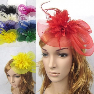 Detail showing multi-color feather fascinators with mesh flowers for wedding and party