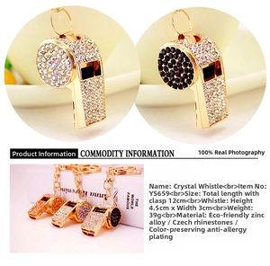 Detailed view of luxury gold-plated whistle keychain featuring sparkling Czech crystals