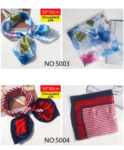 Detail view of 50x50cm satin silk square scarves in floral and striped patterns