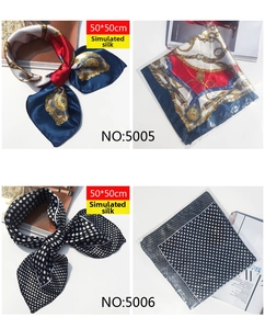 Detail view of 50x50cm silk-feel scarves with vintage chain and polka dot patterns