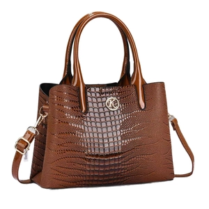 Elegant brown crocodile embossed tote bag with metal logo and adjustable shoulder strap