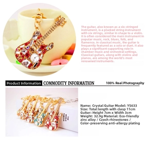 Detail view of crystal guitar keychain with dimensions of 11cm length and 7x3cm width
