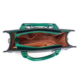 Green faux crocodile handbag with spacious interior compartments and gold hardware