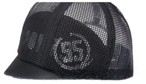 Detail of breathable black mesh structure on a sports baseball cap with silver 55 logo