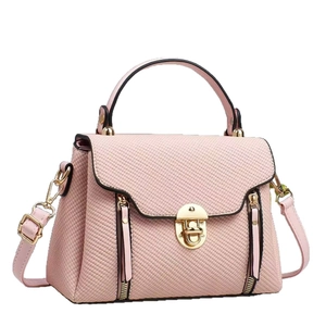 Pink woven texture women handbag with gold metal clasp and adjustable shoulder strap