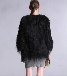 Back view of a mid-length black faux fur coat with high-quality shaggy texture details