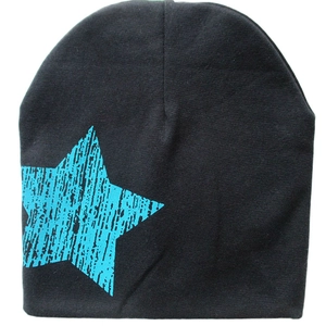 Black knitted baby beanie with a large blue star print on a clean white background