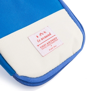 Portable blue first aid pouch for outdoor travel with high density fabric and zipper
