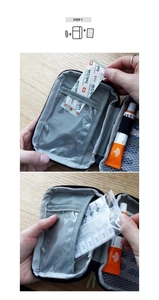 Detail view of the gray portable first aid pouch with internal mesh pockets and slots