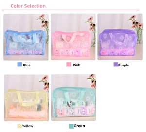 Selection of five colorful floral PVC waterproof toiletry bags with daisy patterns