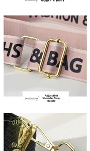 Detail of adjustable woven shoulder strap with gold buckle and fashion lettering