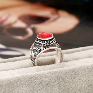 Vintage silver alloy marines ring with faceted red gemstone and eagle relief detail